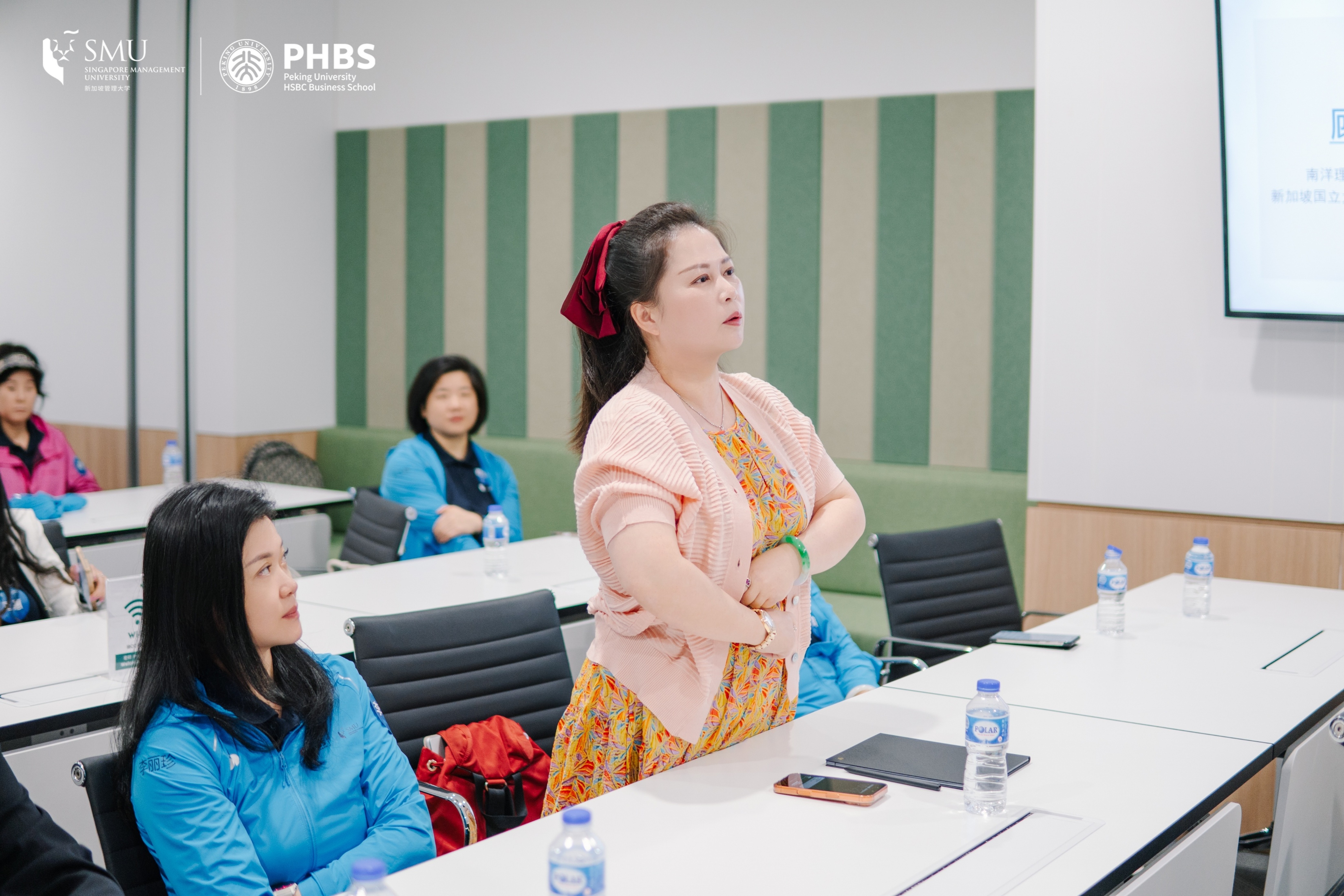 student standing up to ask question